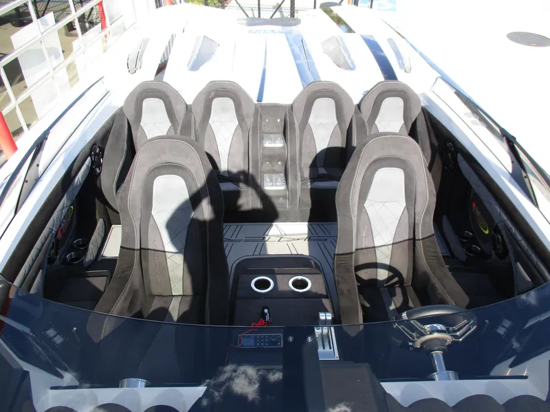 Slide: The Image of Interior of 2015 Skater 46 boat with six seats and modern design. - 12