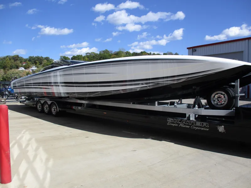 Slide: The Image of 2015 Skater 46 powerboat on a trailer under a clear blue sky. - 5