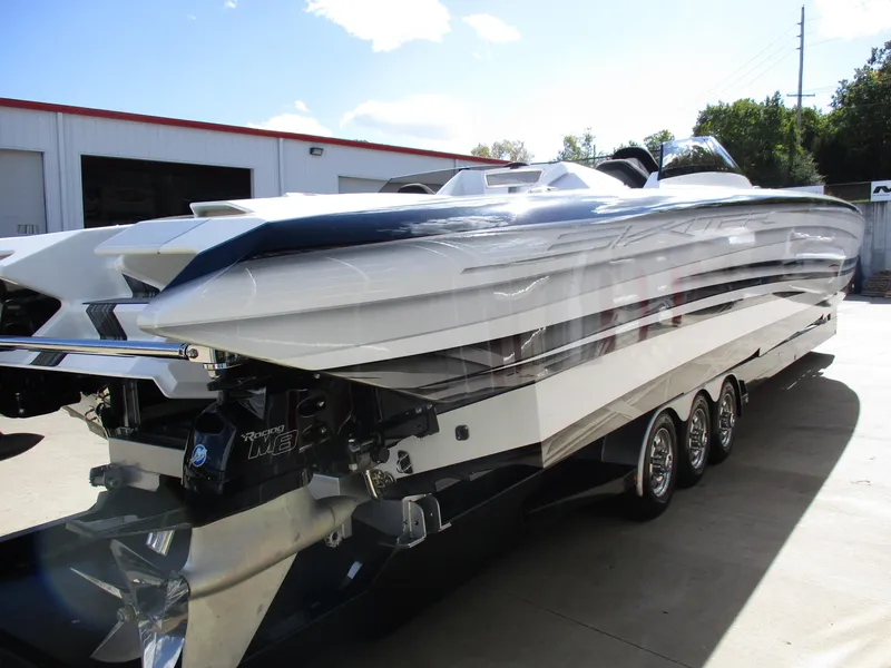 Slide: The Image of 2015 Skater 46 model boat with sleek design and multiple engines. - 6