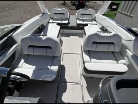 Slide: The Image of 2019 Regal LS6 boat interior with white seating and modern design. - 19