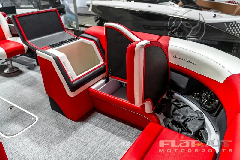 Slide: The Image of 2023 South Bay 523 RS 3.0 Plus Arch 400HP boat interior with red and white seating. - 18
