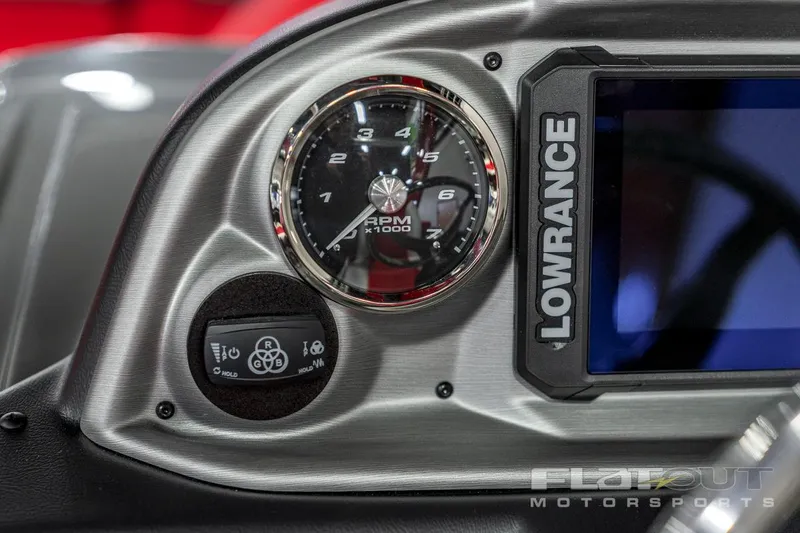 Slide: The Image of Close-up of 2023 South Bay 523 RS 3.0 Plus Arch 400HP dashboard with Lowrance display. - 24