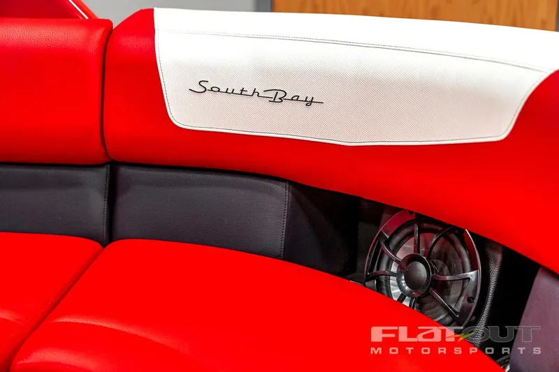 Slide: The Image of 2023 South Bay 523 RS 3.0 Plus Arch 400HP red and white boat seating. - 3
