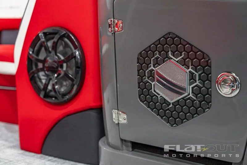 Slide: The Image of Close-up of 2023 South Bay 523 RS 3.0 Plus Arch 400HP boat interior speaker and storage. - 30