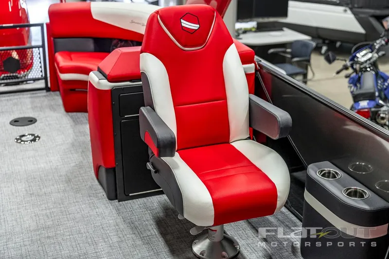 Slide: The Image of 2023 South Bay 523 RS 3.0 Plus Arch 400HP boat interior with red and white captain's chair. - 31