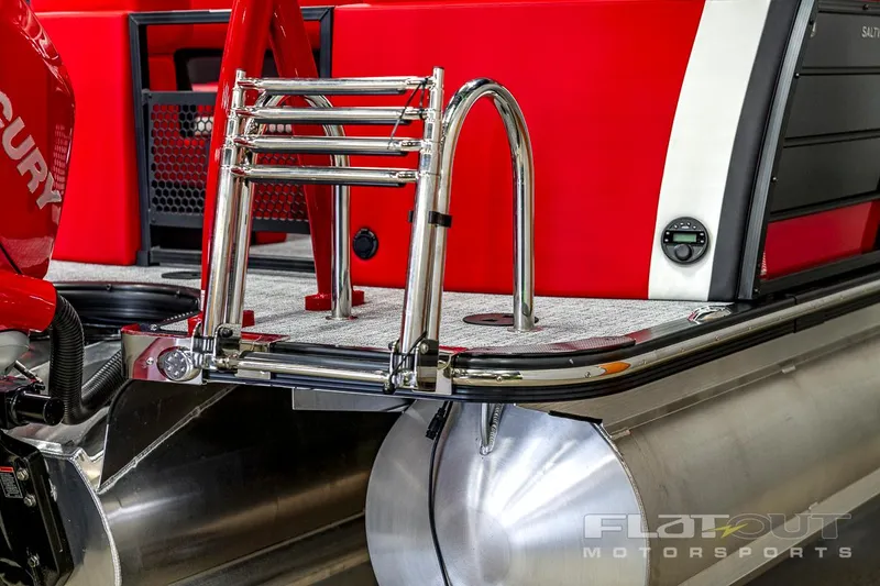 Slide: The Image of 2023 South Bay 523 RS 3.0 Plus Arch 400HP boat rear view with ladder and engine. - 8