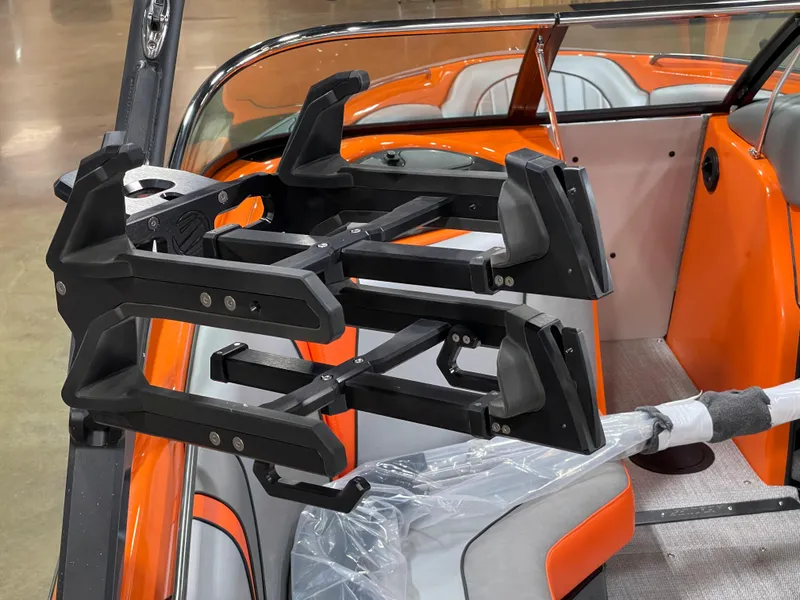 Slide: The Image of 2023 Sanger 237 SX boat with wakeboard rack and orange interior. - 14