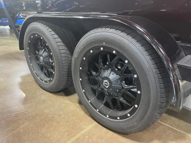 Slide: The Image of 2023 Sanger 237 SX trailer with black alloy wheels. - 8