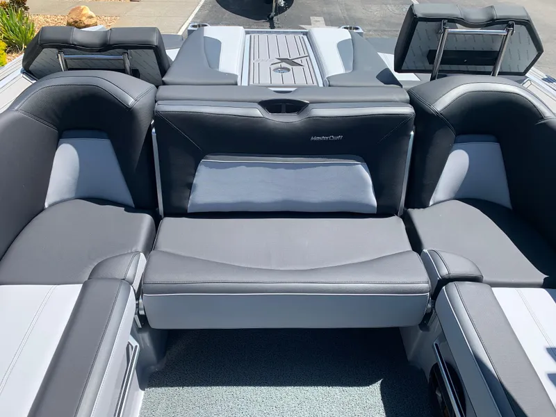 Slide: The Image of 2022 MasterCraft XStar S boat interior with luxurious seating. - 14