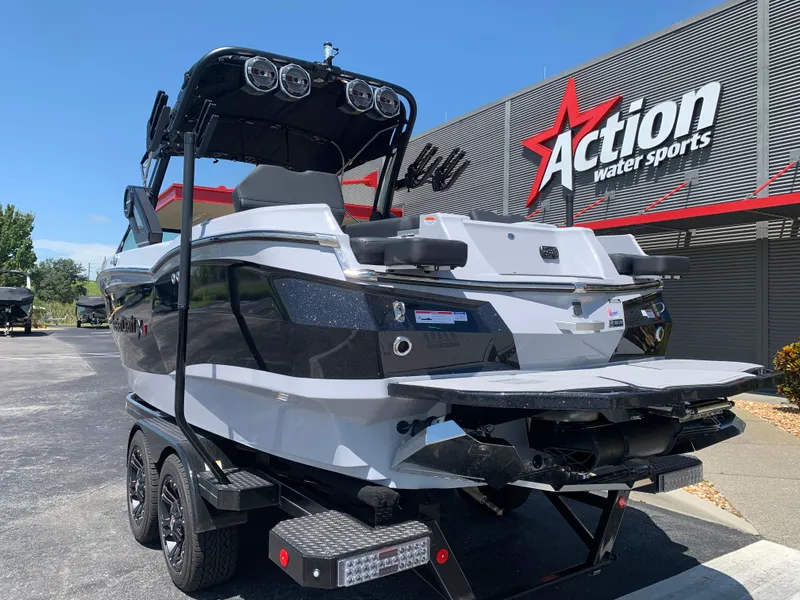 Slide: The Image of 2022 MasterCraft XStar S boat at Action Water Sports dealership. - 7