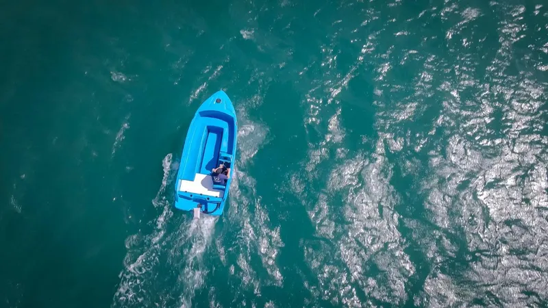 Slide: The Image of Aerial view of 2024 Vision Marine Technologies Phantom boat on open water. - 6
