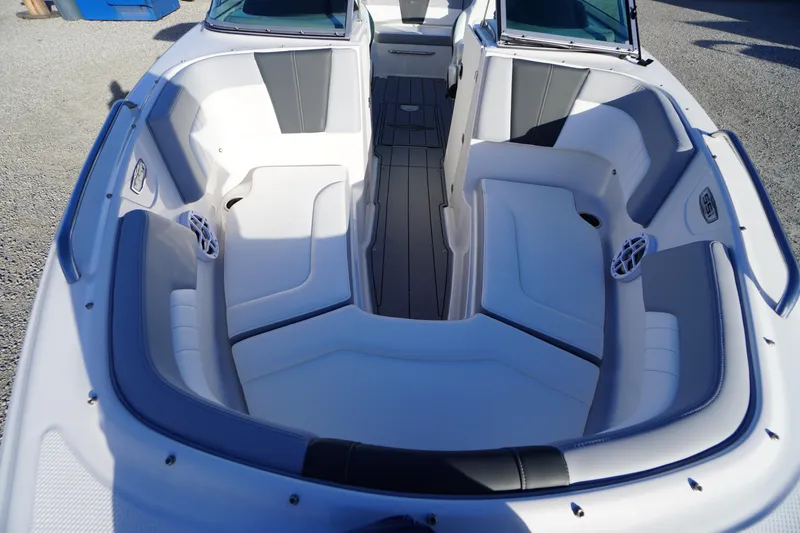 Slide: The Image of 2024 Chaparral 23 SSi OB boat interior with spacious seating and modern design. - 11