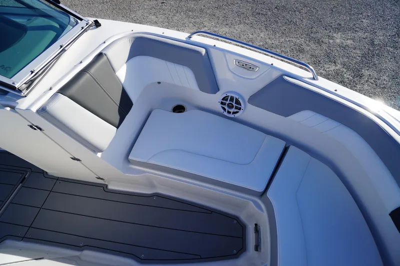 Slide: The Image of 2024 Chaparral 23 SSi OB boat interior with sleek seating and modern design. - 12