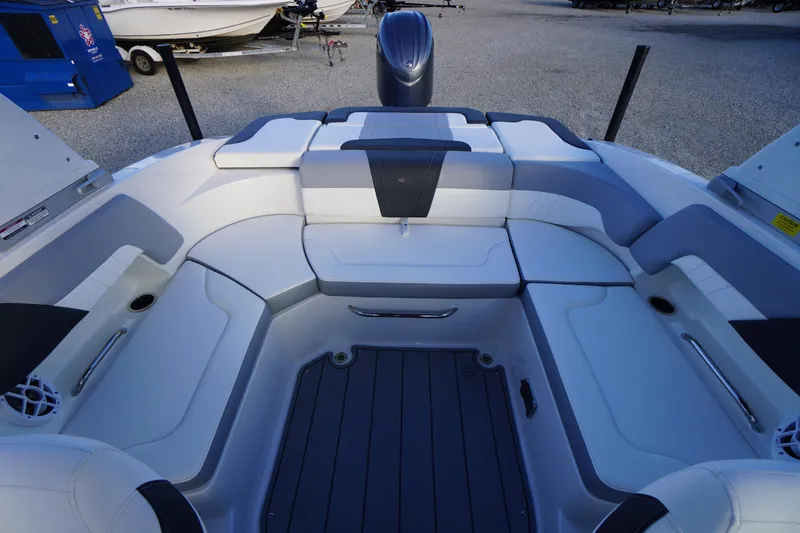 Slide: The Image of 2024 Chaparral 23 SSi OB boat interior with spacious seating and modern design. - 24