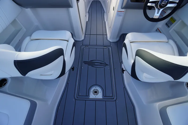 Slide: The Image of 2024 Chaparral 23 SSi OB boat interior with sleek seating and modern design. - 25