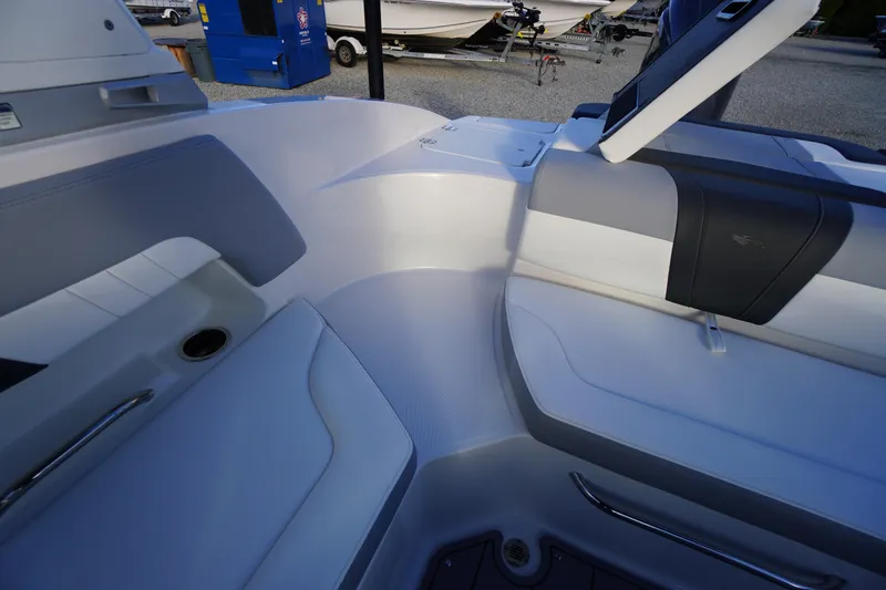 Slide: The Image of 2024 Chaparral 23 SSi OB boat interior with sleek seating and modern design. - 29