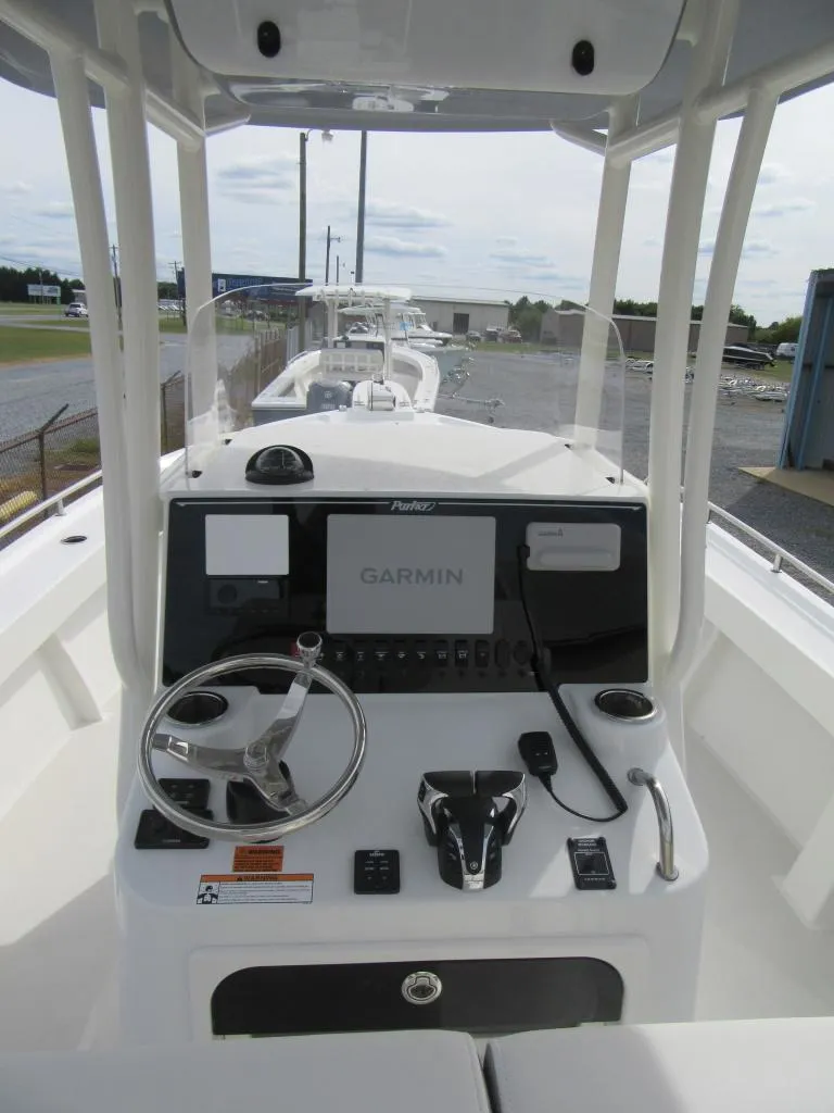 Slide: The Image of 2023 Parker 2501 Center Console boat with Garmin navigation system. - 11