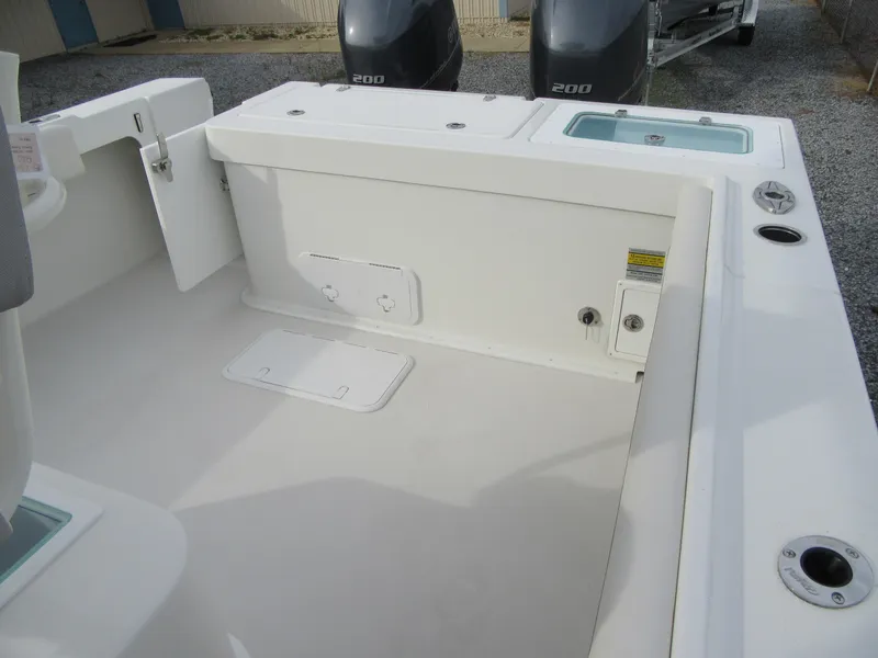 Slide: The Image of 2023 Parker 2501 Center Console boat with twin 200 horsepower engines. - 16