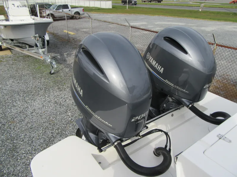 Slide: The Image of 2023 Parker 2501 Center Console with twin Yamaha 200 outboard engines. - 22