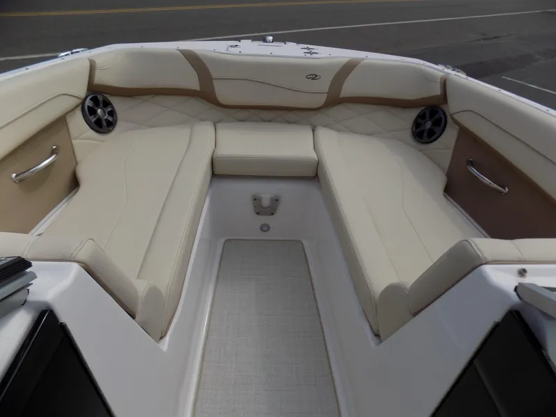 Slide: The Image of 2020 Regal 23 OBX boat interior with beige seating and modern design. - 3