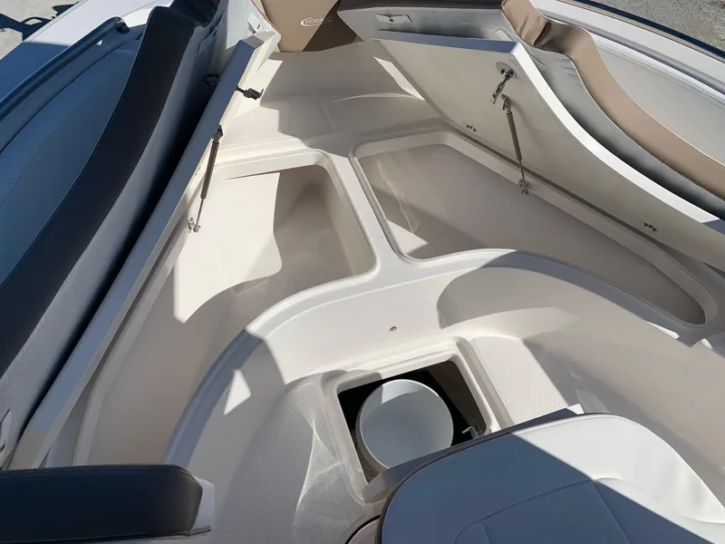 Slide: The Image of 2024 Robalo R222 Center Console boat interior storage compartments. - 16