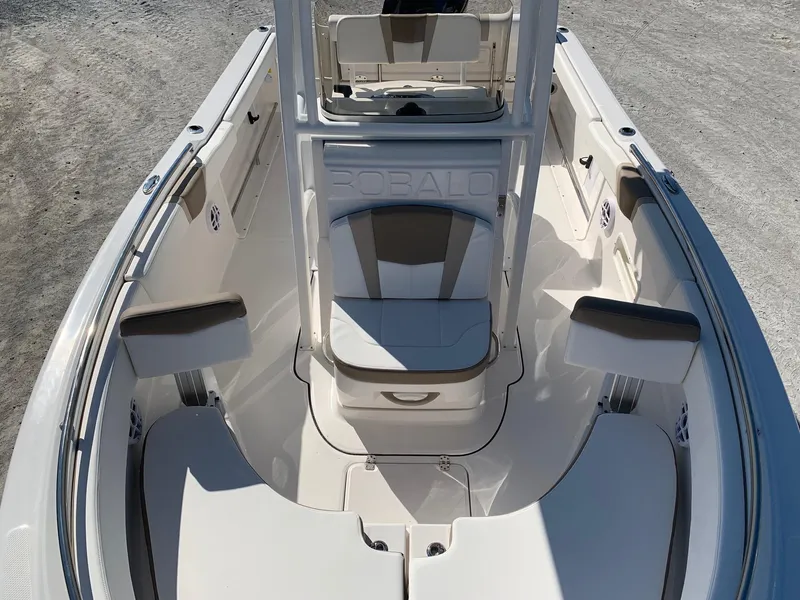 Slide: The Image of 2024 Robalo R222 Center Console boat interior, front seating area. - 18