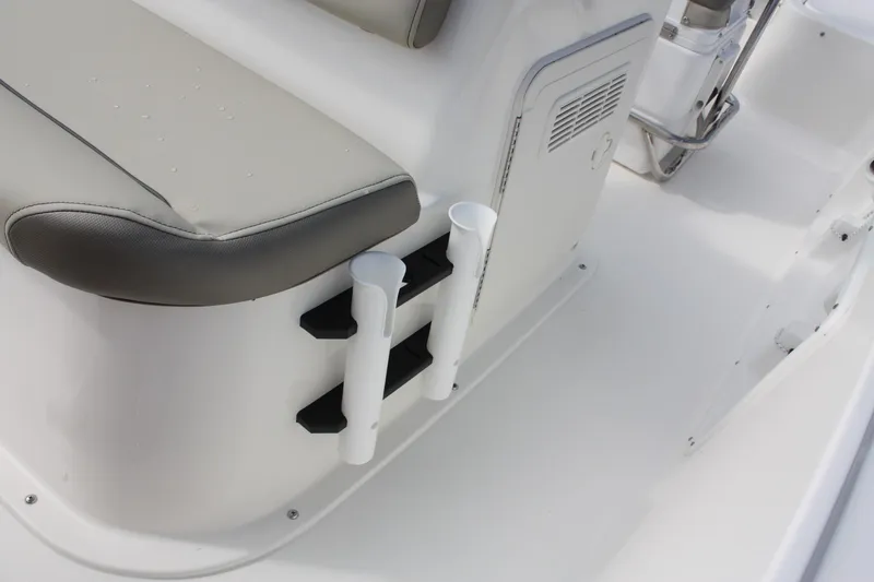 Slide: The Image of 2023 Key West 1720 Center Console boat interior with rod holders and seating. - 19