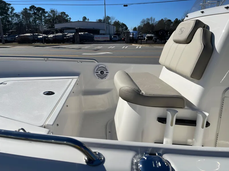 Slide: The Image of 2023 Key West 1720 Center Console boat interior with seating and storage. - 9