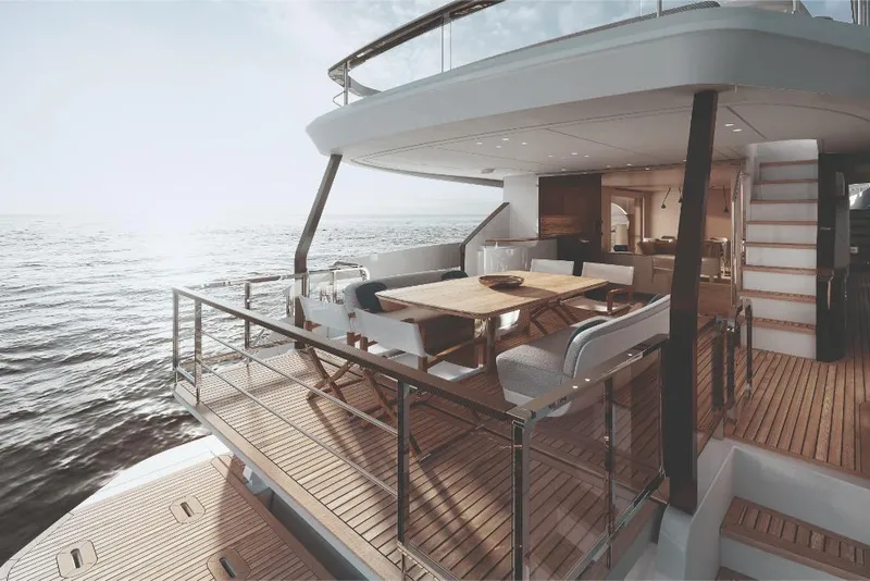 Slide: The Image of Luxury yacht Azimut Grande 26M 2023, elegant outdoor dining area with ocean view. - 5