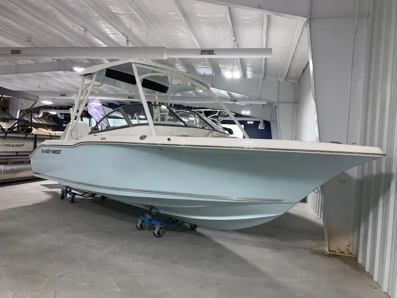 Slide: The Image of 2024 Key West 239 DFS boat in showroom. - 1