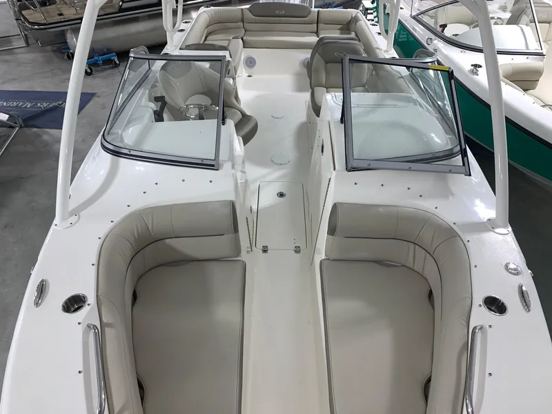 Slide: The Image of 2024 Key West 239 DFS boat interior with seating and windshield. - 4