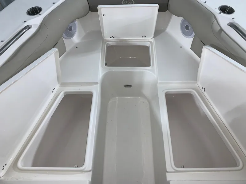Slide: The Image of 2024 Key West 239 DFS boat with open storage compartments. - 5