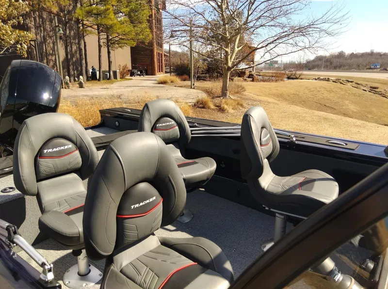 Slide: The Image of 2023 Tracker Targa V-18 WT boat interior with four cushioned seats. - 4