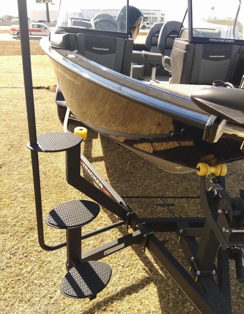 Slide: The Image of 2023 Tracker Targa V-18 WT boat on trailer with boarding steps. - 6