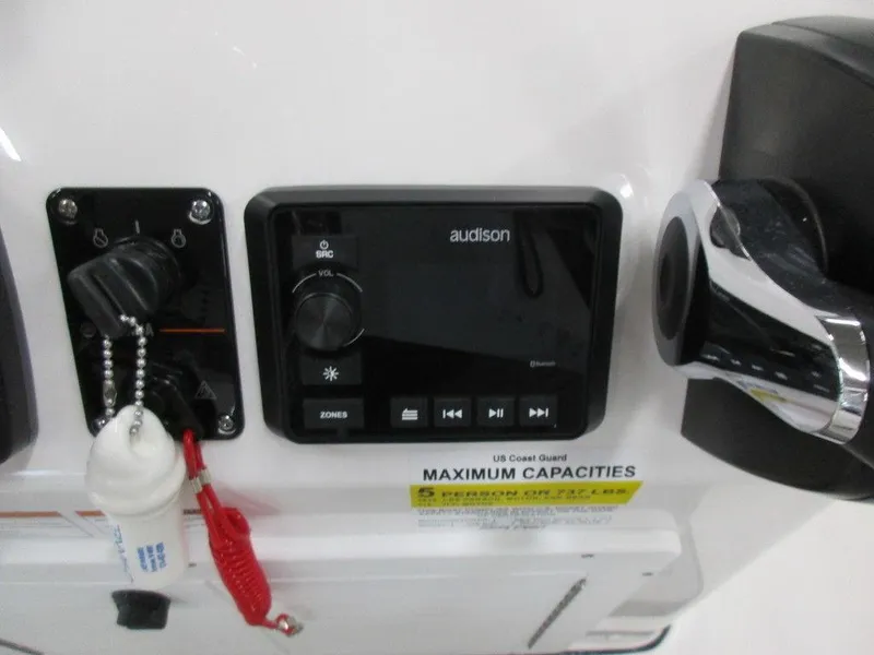 Slide: The Image of 2023 Sea Pro 172 Bay Series boat dashboard with Audison control panel. - 5