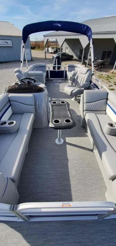 Slide: The Image of 2023 Bennington 22SVSR pontoon boat with spacious seating and modern design. - 4