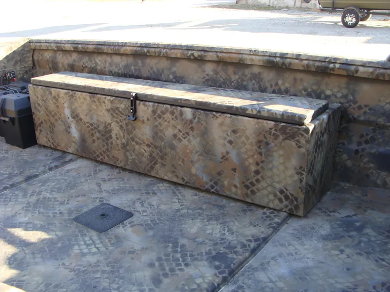 Slide: The Image of 2023 Excel 1754 Pro F4 boat with camouflage seating and storage. - 15