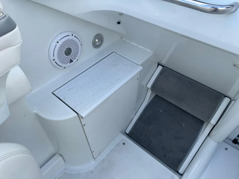 Slide: The Image of 2007 Formula 353 FASTech boat interior with speaker and storage compartment. - 31