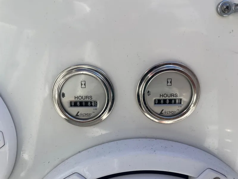 Slide: The Image of Hour meters on a 2007 Formula 353 FASTech boat dashboard. - 32