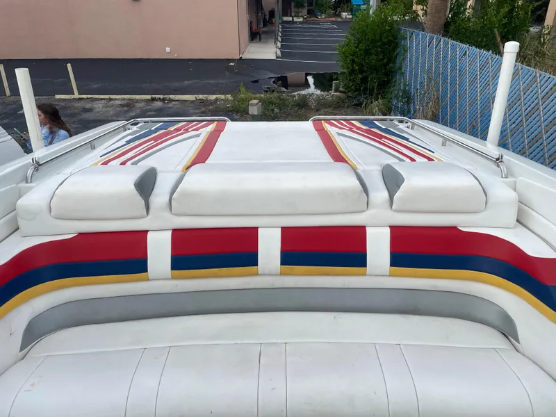 Slide: The Image of 2007 Formula 353 FASTech boat with colorful striped upholstery on deck. - 35