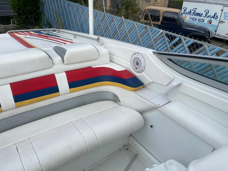 Slide: The Image of 2007 Formula 353 FASTech boat interior with colorful seating and speaker detail. - 37