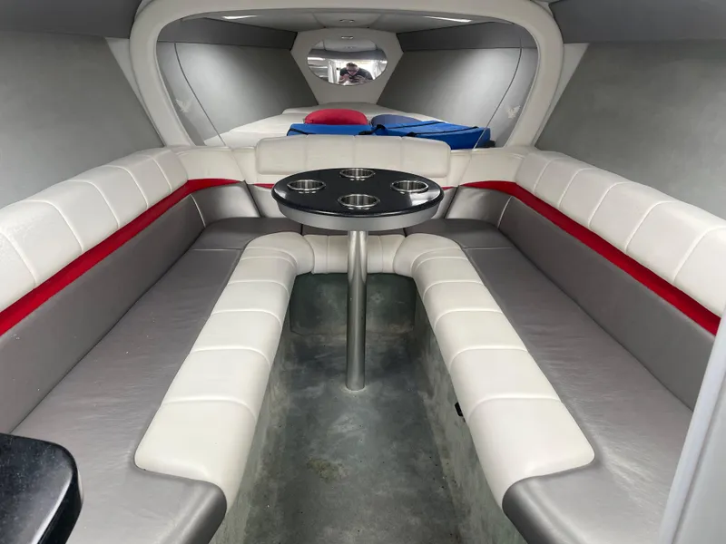 Slide: The Image of Interior of 2007 Formula 353 FASTech boat with white seating and table. - 38