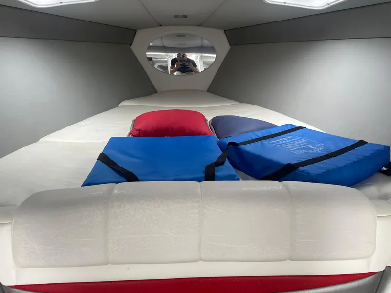 Slide: The Image of Interior cabin of a 2007 Formula 353 FASTech boat with cushions and life jackets. - 39