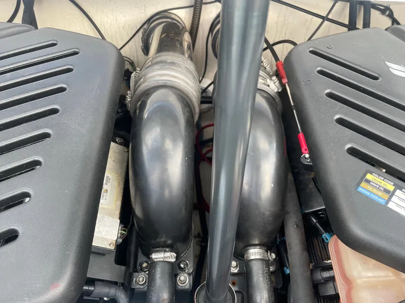 Slide: The Image of Engine compartment of a 2007 Formula 353 FASTech boat showing dual engines. - 48