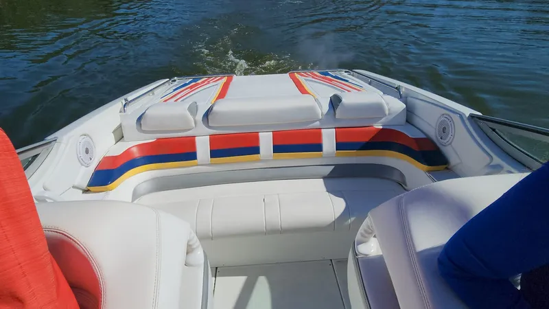 Slide: The Image of 2007 Formula 353 FASTech boat interior with colorful seating on the water. - 5