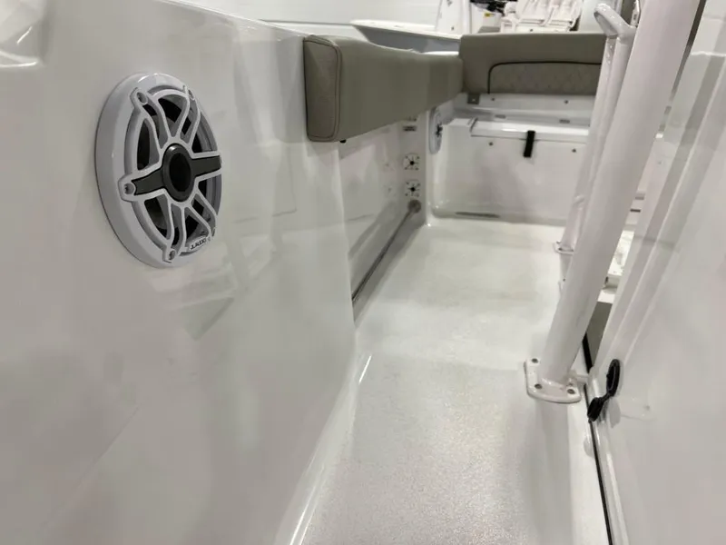 Slide: The Image of 2023 Sportsman 211 Heritage boat interior with speaker and seating. - 15
