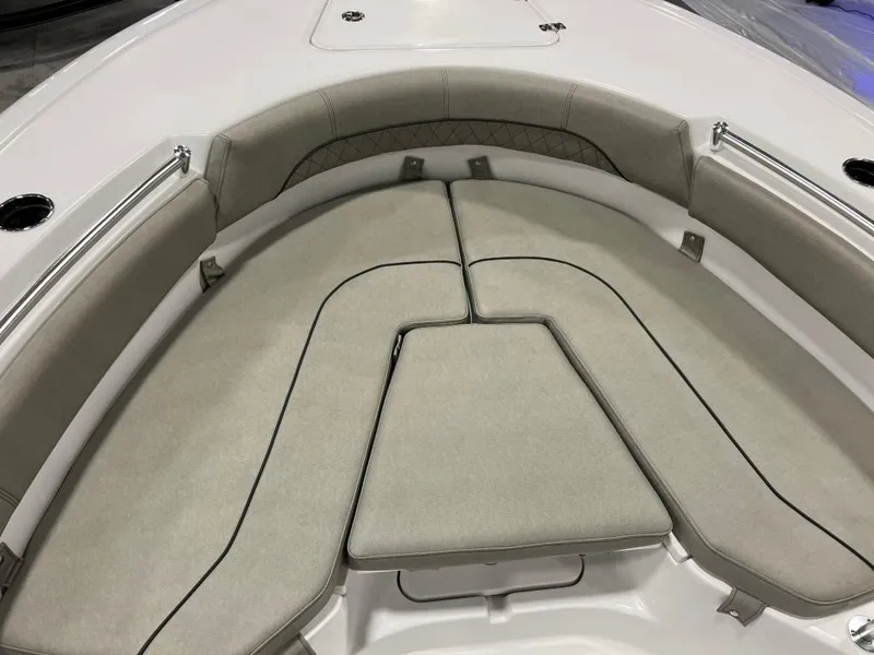 Slide: The Image of 2023 Sportsman 211 Heritage boat with cushioned bow seating area. - 18