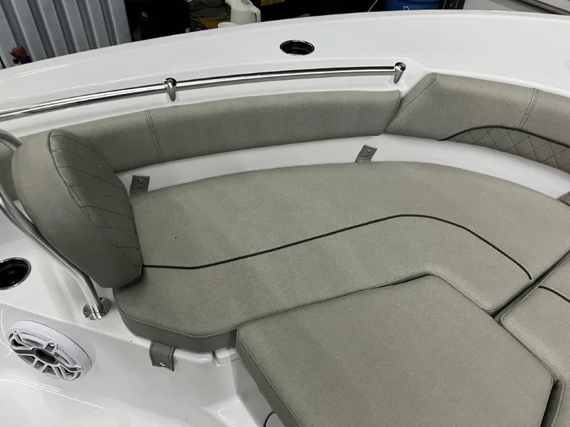 Slide: The Image of 2023 Sportsman 211 Heritage boat with cushioned seating and stainless steel rail. - 19