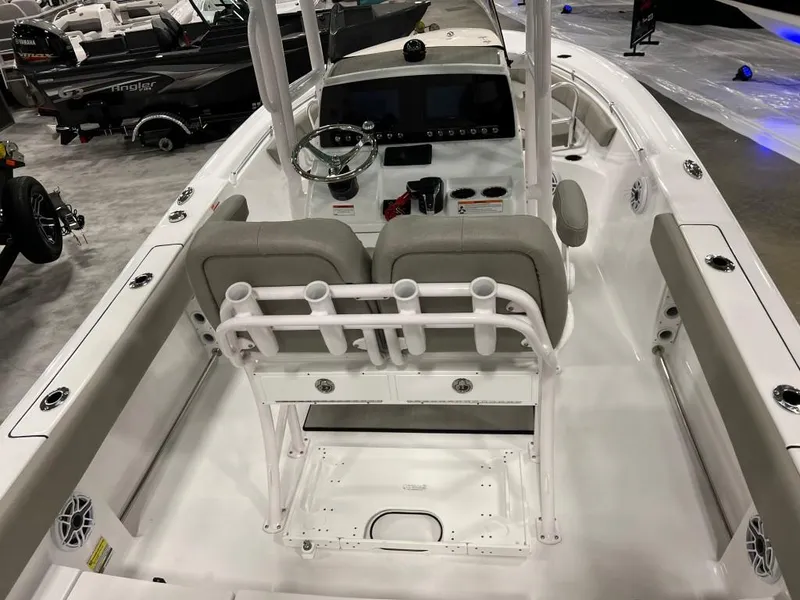 Slide: The Image of 2023 Sportsman 211 Heritage boat interior with dual seats and modern dashboard. - 7