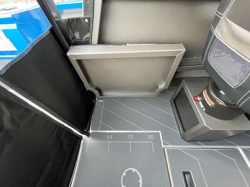 Slide: The Image of Interior of 2025 Stabicraft 2250 Ultra Centercab with foldable seat and storage. - 13